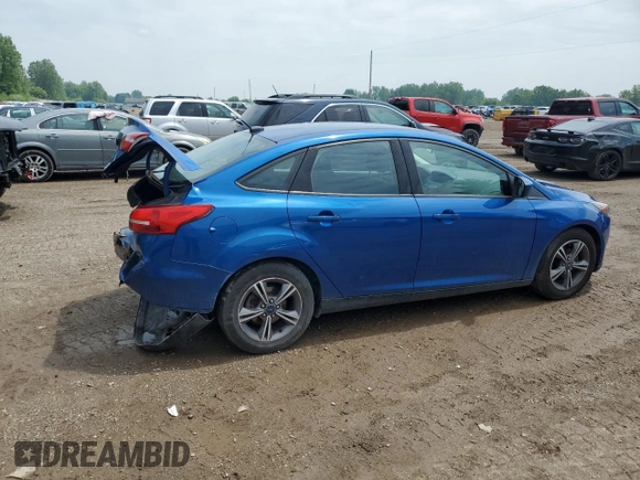 2018 Ford Focus SE with VIN 1FADP3FEXJL282378, listed as a Copart auction lot 59371975 with 30,029 mi miles and Salvage title. Bid and sale history available at DreamBid. Image 3.
