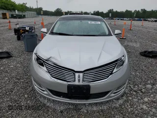 2016 Lincoln MKZ z VIN 3LN6L2JK1GR617572, wystawiony jako Copart lot #59119845 z przebiegiem 155 191 mil mil oraz Szkoda całkowita • Salvage title. Historia ofert i sprzedaży dostępna na DreamBid. Obrazek 5.