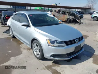 2014 Volkswagen Jetta TDI w/Premium with VIN 3VWLL7AJ6EM424935, listed as a IAAI auction lot 41533634 with 64,028 mi miles and . Bid and sale history available at DreamBid. Image 1.