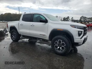 2024 GMC Canyon 4WD AT4X with VIN 1GTP6EEKXR1134879, listed as a Copart auction lot 80822964 with 12,567 mi miles and Salvage Title. Bid and sale history available at carsss.com. Image 4.