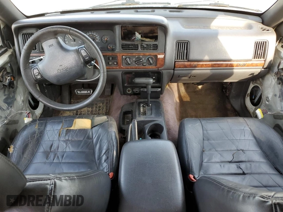 1996 Jeep Grand Cherokee Laredo z VIN 1J4EX58S3TC144191, wystawiony jako Copart lot #53153495 z przebiegiem 197 853 mil mil oraz Szkoda całkowita • Salvage title. Historia ofert i sprzedaży dostępna na DreamBid. Obrazek 8.