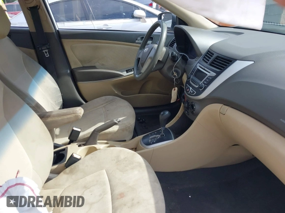 2014 Hyundai Accent GLS z VIN KMHCT4AE5EU697201, wystawiony jako IAAI lot #42157098 z przebiegiem 139 181 mil mil oraz . Historia ofert i sprzedaży dostępna na DreamBid. Obrazek 5.