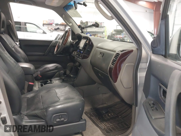 2002 Mitsubishi Montero Limited z VIN JA4MW51RX2J048087, wystawiony jako IAAI lot #42096678 z przebiegiem 218 795 mil mil oraz . Historia ofert i sprzedaży dostępna na DreamBid. Obrazek 5.