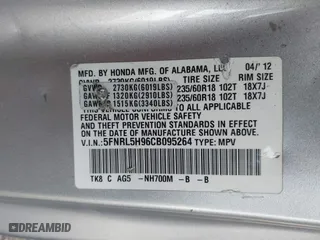 2012 Honda Odyssey Touring with VIN 5FNRL5H96CB095264, listed as a IAAI auction lot 41403450 with 246,199 mi miles. Bid and sale history available at carsss.com. Image 9.