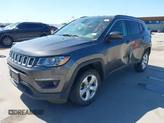 2018 Jeep Compass Altitude with VIN 3C4NJDBBXJT185252, listed as a IAAI auction lot 41847785 with 126,915 mi miles and . Bid and sale history available at carsss.com. Image 2.