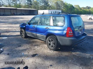 2003 Subaru Forester X with VIN JF1SG63613H743804, listed as a IAAI auction lot 42012850 with 266,100 mi miles. Bid and sale history available at carsss.com. Image 3.