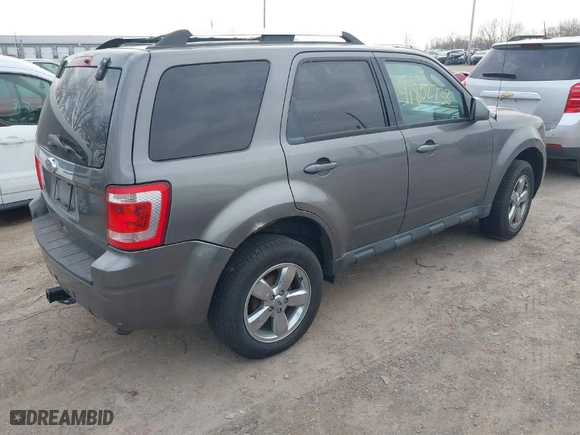 2012 Ford Escape Limited with VIN 1FMCU0E73CKB00640, listed as a IAAI auction lot 41802738 with 128,866 mi miles. Bid and sale history available at carsss.com. Image 4.