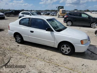 2002 Hyundai Accent GL with VIN KMHCG35C82U230535, listed as a Copart auction lot 77709454 with 116,200 mi miles and Non Repairable. Bid and sale history available at carsss.com. Image 4.