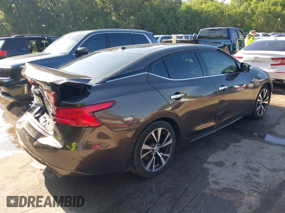 2016 Nissan Maxima Platinum z VIN 1N4AA6AP3GC385276, wystawiony jako IAAI lot #42547410 z przebiegiem 100 307 mil mil oraz . Historia ofert i sprzedaży dostępna na DreamBid. Obrazek 4.