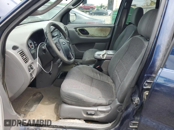 2002 Ford Escape XLT Choice with VIN 1FMYU04192KD87001, listed as a Copart auction lot 57860475 with 195,323 mi miles and Salvage title. Bid and sale history available at DreamBid. Image 7.