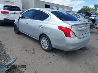 2013 Nissan Versa S Plus with VIN 3N1CN7AP5DL860166, listed as a IAAI auction lot 42272580 with 155,510 mi miles and . Bid and sale history available at DreamBid. Image 3.