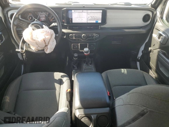 2024 Jeep Wrangler Sport S with VIN 1C4PJXDG3RW173078, listed as a Copart auction lot 57075565 with 26,661 mi miles and Salvage title. Bid and sale history available at DreamBid. Image 8.