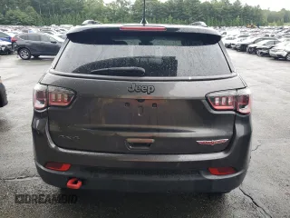 2021 Jeep Compass Trailhawk z VIN 3C4NJDDB4MT571716, wystawiony jako Copart lot #63977335 z przebiegiem 135 382 mil mil oraz Czysty tytuł • Clean title. Historia ofert i sprzedaży dostępna na DreamBid. Obrazek 6.