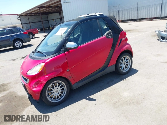 2011 Smart fortwo Passion z VIN WMEEK3BA7BK427739, wystawiony jako IAAI lot #42224225 z przebiegiem 31 675 mil mil oraz . Historia ofert i sprzedaży dostępna na DreamBid. Obrazek 2.