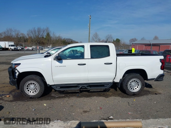 2023 Chevrolet Colorado 2WD Work Truck z VIN 1GCPSBEK8P1201275, wystawiony jako IAAI lot #40877600 z przebiegiem 20 053 mil mil oraz . Historia ofert i sprzedaży dostępna na DreamBid. Obrazek 14.