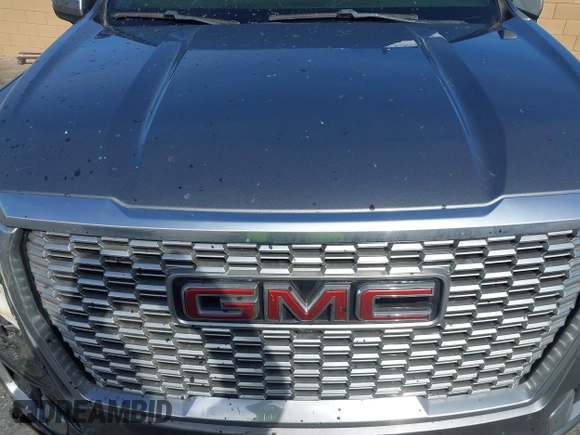 2021 GMC Yukon Denali with VIN 1GKS2DKLXMR230331, listed as a IAAI auction lot 41333736 with 1 mi miles. Bid and sale history available at carsss.com. Image 10.