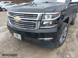 2016 Chevrolet Tahoe LTZ with VIN 1GNSKCKC2GR104305, listed as a IAAI auction lot 41697868 with 124,670 mi miles. Bid and sale history available at carsss.com. Image 17.