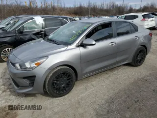 2023 Kia Rio S with VIN 3KPA24AD3PE517933, listed as a Copart auction lot 41072394 with 26,058 mi miles and Salvage Title. Bid and sale history available at DreamBid. Image 1.