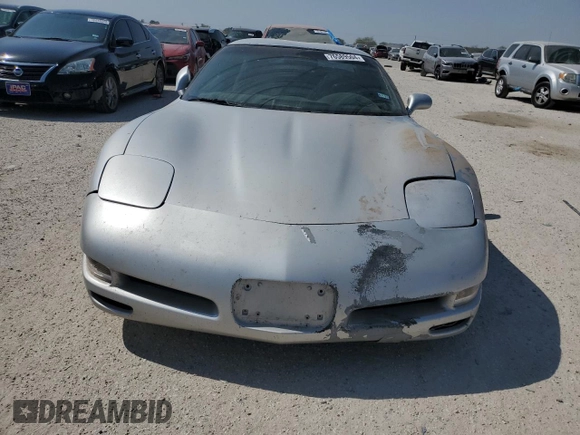 2003 Chevrolet Corvette with VIN 1G1YY22G835100879, listed as a Copart auction lot 76589504 with Not Provided miles and Salvage Title. Bid and sale history available at carsss.com. Image 5.