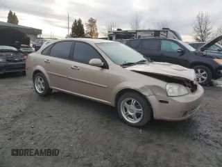 2007 Suzuki Forenza z VIN KL5JD56Z07K657218, wystawiony jako Copart lot #86767854 z przebiegiem 93 044 mil mil oraz Szkoda całkowita • Salvage title. Historia ofert i sprzedaży dostępna na DreamBid. Obrazek 4.
