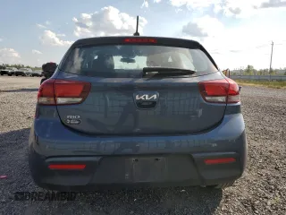 2023 Kia Rio S with VIN 3KPA25AD5PE548218, listed as a Copart auction lot 71808674 with 24,412 mi miles and Salvage Title. Bid and sale history available at DreamBid. Image 6.