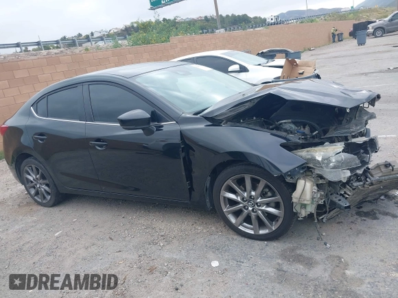2018 Mazda 3 Touring with VIN 3MZBN1V30JM201671, listed as a IAAI auction lot 42189105 with 174,284 mi miles and . Bid and sale history available at carsss.com. Image 13.