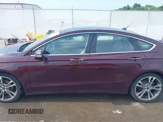 2017 Ford Fusion Titanium z VIN 3FA6P0K94HR271307, wystawiony jako IAAI lot #42595411 z przebiegiem 100 344 mil mil oraz . Historia ofert i sprzedaży dostępna na DreamBid. Obrazek 15.
