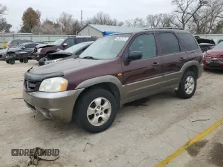 2001 Mazda Tribute LX with VIN 4F2YU08141KM26185, listed as a Copart auction lot 82653374 with 198,432 mi miles and Salvage Title. Bid and sale history available at DreamBid. Image 1.