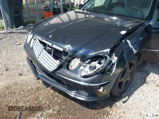 2005 Mercedes-Benz E-Class 3.2L with VIN WDBUF65J05A634879, listed as a IAAI auction lot 39904592 with 4,835 mi miles. Bid and sale history available at carsss.com. Image 6.
