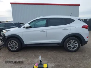 2016 Hyundai Tucson Sport with VIN KM8J33A2XGU242256, listed as a IAAI auction lot 41065573 with 97,503 mi miles. Bid and sale history available at carsss.com. Image 15.