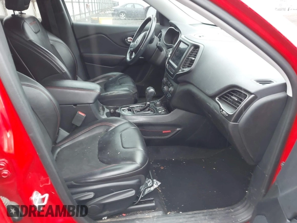 2019 Jeep Cherokee Trailhawk with VIN 1C4PJMBX4KD337408, listed as a IAAI auction lot 41788054 with 42,365 mi miles and . Bid and sale history available at DreamBid. Image 5.