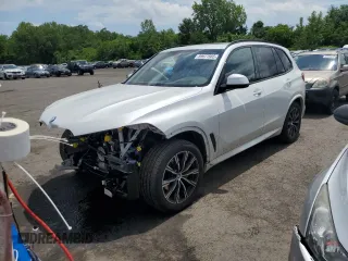 2021 BMW X5 xDrive40i with VIN 5UXCR6C02M9F25534, listed as a Copart auction lot 59977665 with 64,802 mi miles and Salvage title. Bid and sale history available at DreamBid. Image 1.