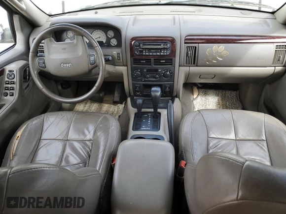 2004 Jeep Grand Cherokee Limited с VIN 1J4GW58N14C208543, выставлен на аукционе Copart как лот 64624035 с пробегом 144 362 миль миль и Списание • Salvage title. История ставок и продаж доступна на DreamBid. Изображение 8.