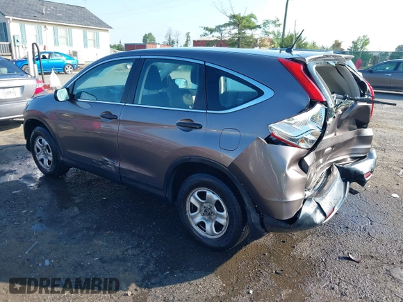 2013 Honda CR-V LX with VIN 3CZRM3H31DG703436, listed as a IAAI auction lot 42702584 with 140,013 mi miles and . Bid and sale history available at DreamBid. Image 3.