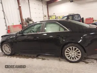 2012 Cadillac CTS Premium with VIN 1G6DP5E30C0108722, listed as a IAAI auction lot 41844089 with 176,525 mi miles and . Bid and sale history available at DreamBid. Image 14.