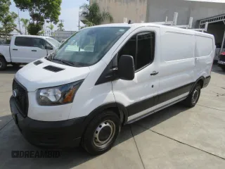 2023 Ford Transit Cargo with VIN 1FTYE1Y81PKB92726, listed as a Copart auction lot 87962485 with 13,373 mi miles and Salvage Title. Bid and sale history available at DreamBid. Image 2.