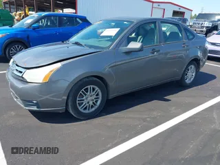 2009 Ford Focus SE with VIN 1FAHP35N19W246382, listed as a IAAI auction lot 42043020 with 197,707 mi miles. Bid and sale history available at carsss.com. Image 2.