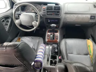 2001 Suzuki XL7 Standard z VIN JS3TX92V814116919, wystawiony jako Copart lot #72758694 z przebiegiem 185 153 mil mil oraz Szkoda całkowita • Salvage title. Historia ofert i sprzedaży dostępna na DreamBid. Obrazek 8.