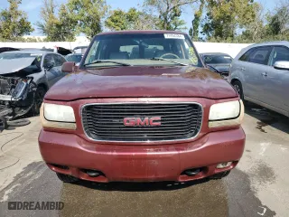 1999 GMC Denali with VIN 1GKEK13RXXR910328, listed as a Copart auction lot 71494384 with 251,016 mi miles and Salvage Title. Bid and sale history available at carsss.com. Image 5.