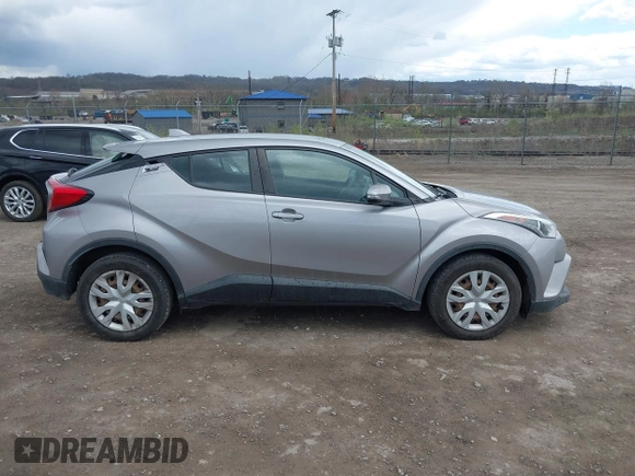 2019 Toyota C-HR XLE with VIN NMTKHMBX7KR079751, listed as a IAAI auction lot 42013399 with 74,665 mi miles. Bid and sale history available at carsss.com. Image 14.