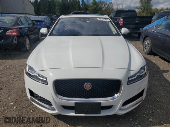 2016 Jaguar XF 35t Prestige with VIN SAJBK4BV3GCY19128, listed as a Copart auction lot 74187394 with 70,510 mi miles and Salvage Title. Bid and sale history available at carsss.com. Image 5.