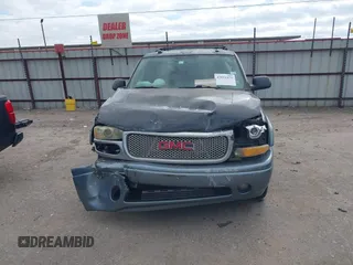 2004 GMC Yukon SLT z VIN 1GKEC13Z44J310511, wystawiony jako IAAI lot #42011475 z przebiegiem 218 746 mil mil oraz . Historia ofert i sprzedaży dostępna na DreamBid. Obrazek 6.