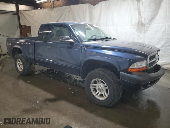 2004 Dodge Dakota Sport with VIN 1D7HG32N54S525290, listed as a Copart auction lot 77141804 with 217,012 mi miles and Salvage Title. Bid and sale history available at carsss.com. Image 4.