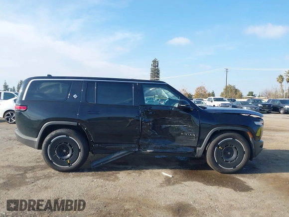 2025 Rivian R1S Adventure with VIN 7PDSGBBAXSN055849, listed as a IAAI auction lot 41255282 with 2,885 mi miles. Bid and sale history available at carsss.com. Image 14.