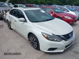 2016 Nissan Altima S z VIN 1N4AL3AP1GC135897, wystawiony jako IAAI lot #42111996 z przebiegiem 163 914 mil mil oraz . Historia ofert i sprzedaży dostępna na DreamBid. Obrazek 1.