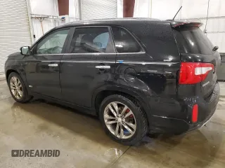 2014 Kia Sorento SX z VIN 5XYKWDA73EG444128, wystawiony jako Copart lot #58908875 z przebiegiem 189 141 mil mil oraz Czysty tytuł • Clean title. Historia ofert i sprzedaży dostępna na DreamBid. Obrazek 2.