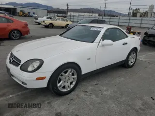 1999 Mercedes-Benz SLK-Class with VIN WDBKK47F1XF123686, listed as a Copart auction lot 82375414 with 157,125 mi miles and Salvage Title. Bid and sale history available at carsss.com. Image 1.