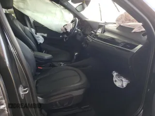 2017 BMW X1 sDrive28i with VIN WBXHU7C34HP924730, listed as a Copart auction lot 52245005 with 0 mi miles and Salvage Title. Bid and sale history available at carsss.com. Image 7.