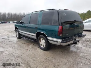 1996 Chevrolet Tahoe with VIN 1GNEK13R1TJ388054, listed as a IAAI auction lot 41368047 with 155,138 mi miles. Bid and sale history available at carsss.com. Image 3.