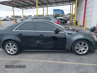 2011 Cadillac CTS Luxury with VIN 1G6DF5EYXB0103430, listed as a IAAI auction lot 42105337 with 205,069 mi miles and . Bid and sale history available at DreamBid. Image 6.